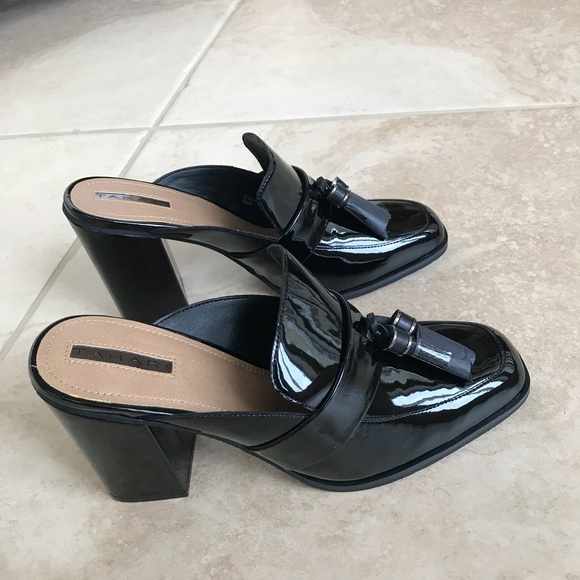 Tahari Shoes - TAHARI patent Tassle loafers mule